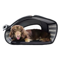 Miniature dachshund lying down inside the IBIYAYA EVA 4-in-1 Multifunctional Pet Backpack Carrier with Wheels