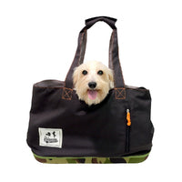 IBIYAYA Color Play Pet Carrier in Black & Camouflage carrying small dog