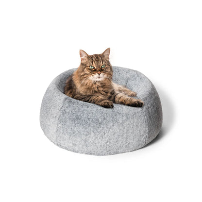 SNOOZA™ Cat Memory Nest with a kitty lying on it