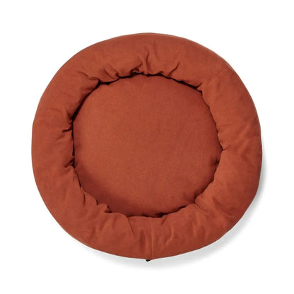 SNOOZA Self Warming Polar Fleece Cuddler in Rust, viewed from above